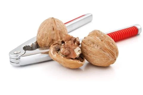 Nutcracker and walnuts Stock Photos