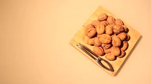 Nutcracker and walnuts vertical wide dolly Vídeos de archivo 58885318