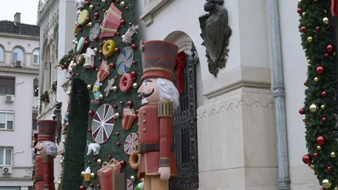 Nutcracker Figures Stand Outside Craiova City Hall Vídeos de archivo 323712261