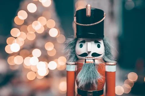 Nutcracker with holiday lighting background Stock Photos