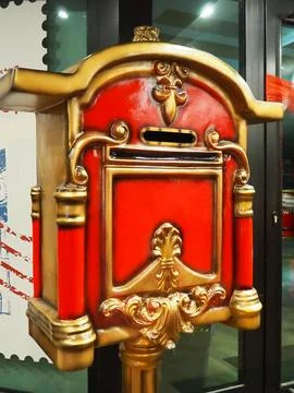 Nutcracker mailbox in festive New Year's Christmas style. Red gold postbox Stock Photos