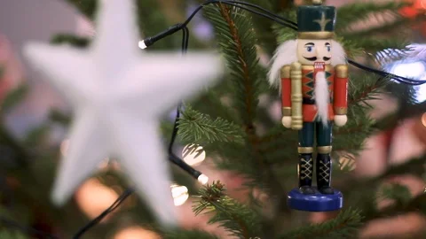Nutcracker Soldier on a Christmas Tree With Blurred Background. Stock Footage 100339191
