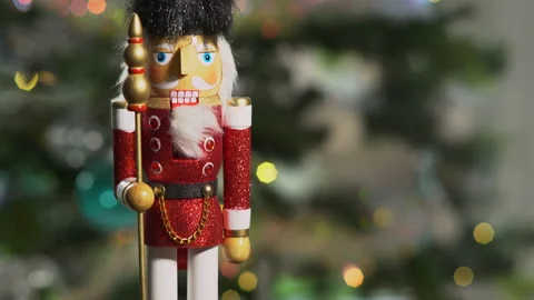 Nutcracker soldier in front of Christmas tree Stock Footage 144252741
