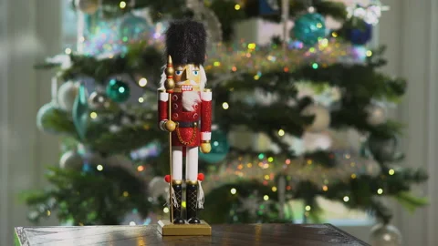 Nutcracker soldier wide shot in front of Christmas tree Stock Footage 144252688