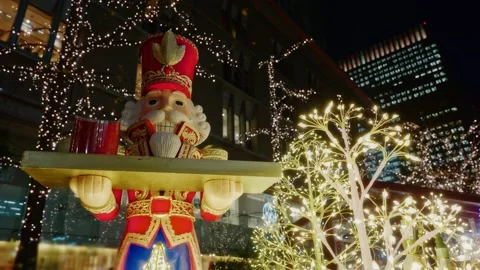 Nutcracker Statue and Golden Christmas Lights in Tokyo 스톡 동영상 330873395