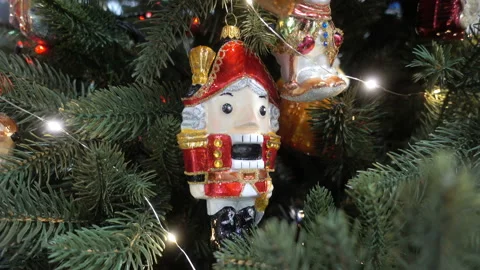 The nutcracker toy on the Christmas tree in 4K Stock Footage 163872272