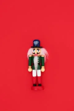 Nutcracker Toy Soldier on Red Background. Stock Photos
