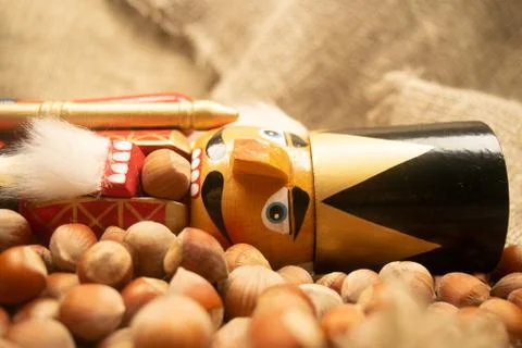 Nutcracker wooden figure of a soldier for cracking nuts on the background of  Stock Photos