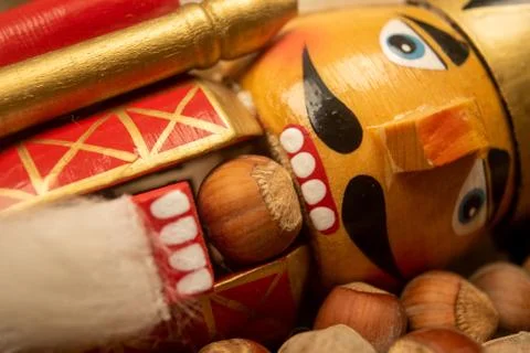 Nutcracker wooden figure of a soldier for cracking nuts on the background of  Stock Photos
