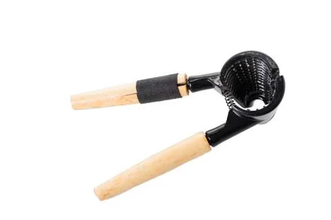 Nutcracker with wooden handle is broken. Stock Photos