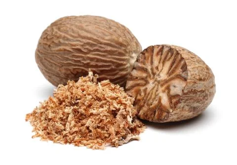 Nutmeg and nutmeg granules Stock Photos