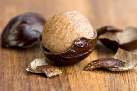 Nutmeg in a fragmented nutshell Stock Photos