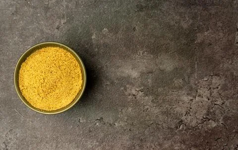Nutmeg Powder from a flat lay angle with a dramatic dark background. Foto stock