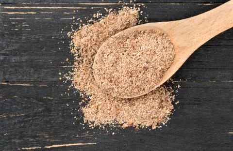 Nutmeg powder in spoon Stock Photos