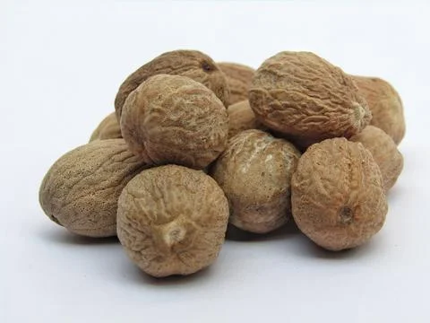 Nutmeg on white background close-up view  Stock-Fotos