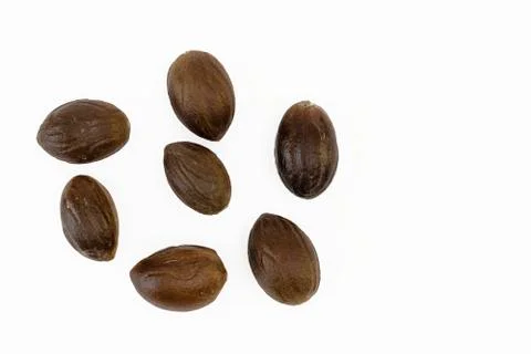 Nutmeg on white Stock Photos