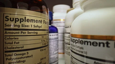 Nutritional Supplements Containers. White Plastic Supplement Bottles Stock Footage 337388507