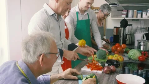 Nutritionist and trainees in a training kitchen Stock Footage 249409193