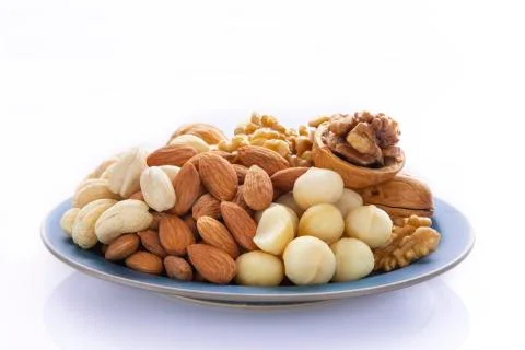 Nutritious, mixed nuts, walnuts, almonds, cashews, macadamia nuts Foto stock
