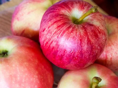 Nutritious Red Fruit. Close-up of apples, showcasing their nutritious value. Stock Photos