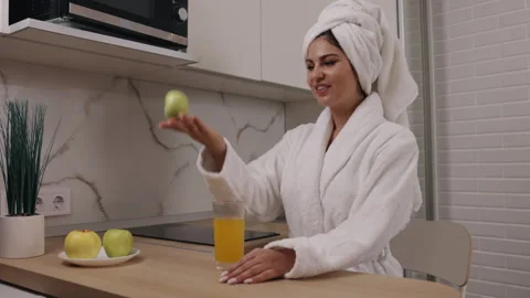 Nutritious start, Juice consumption, Healthy kitchen Stock Footage 306318787