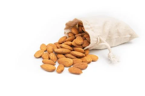 Nuts almonds in a bag on a white background Stock Photos