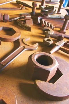 Nuts and bolts background, construction tools Stock Photos