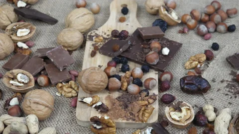 Nuts and chocolate. Cocoa and fruits. Video stock 170605384