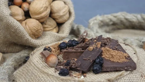 Nuts and chocolate. Cocoa and fruits. Video stock 170605601