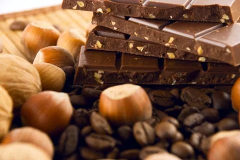 Nuts and chocolate Stock Photos