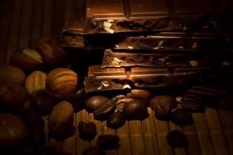 Nuts and chocolate Stock Photos