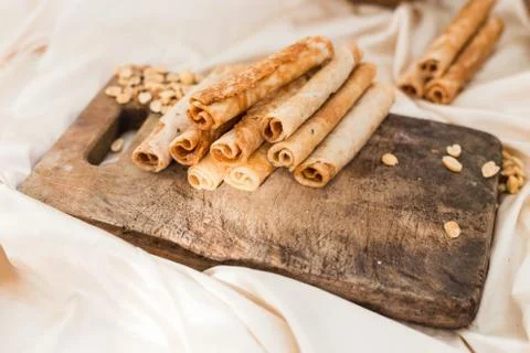 Nuts and coconut waffles on a cutting board Stock Photos