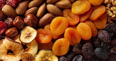 Nuts and dried fruit Stock Photos