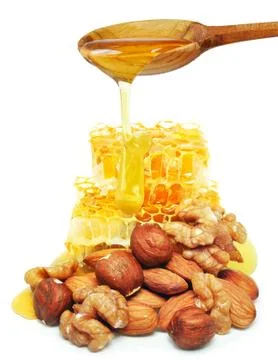Nuts and honeycomb Stock Photos