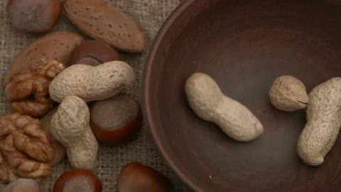 Nuts and Peanuts Presenting in an Inviting, Rustic and Cozy Setting for Everyone Stock Footage 289996776