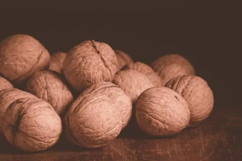 Nuts are scattered on the table. Stock Photos