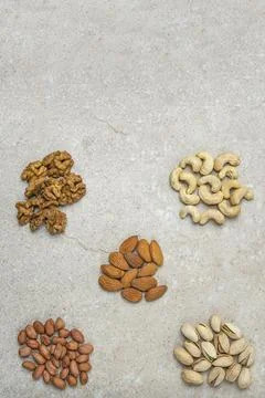 Nuts background, top view. The natural background is made from different Stock Photos