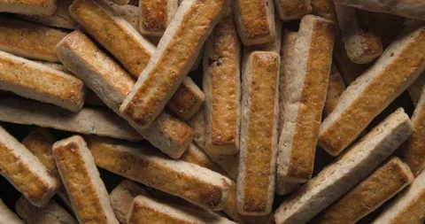 Nuts biscuits close up studio shot over rotating Video stock 334255616