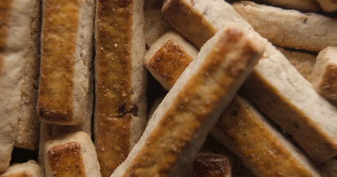 Nuts biscuits close up studio shot over rotating Video stock 334255675