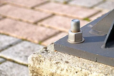 Nuts bolts pole of a lighting post base Stock Photos