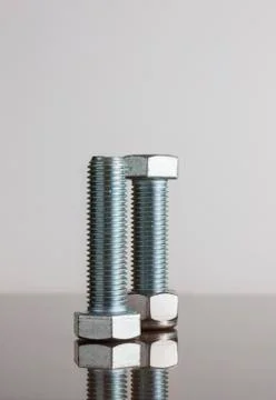 Nuts &amp; Bolts with reflection Stock Photos
