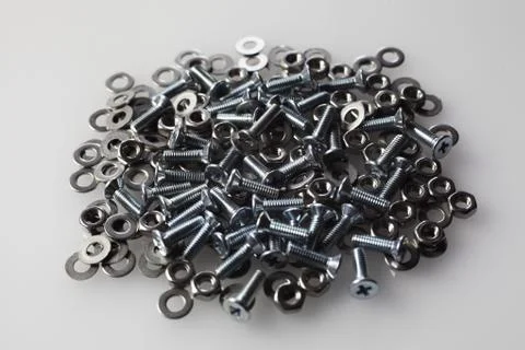 Nuts, bolts, washers on the table Foto stock