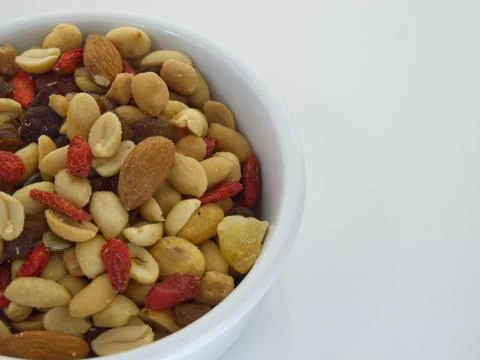 Nuts in bowl on white background Stock Photos