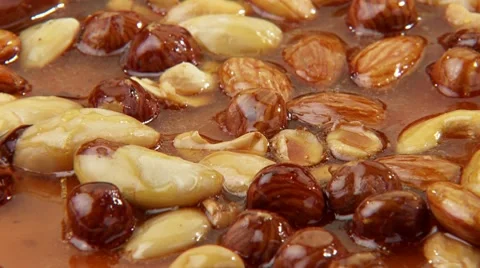 Nuts in caramel Stock Footage 8571327