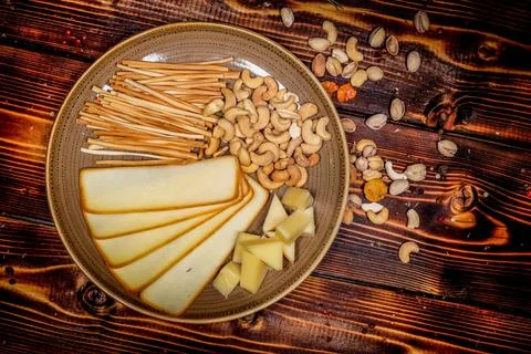 Nuts with cheese studio shot plating idea. Commercial food photography, shot  Foto stock