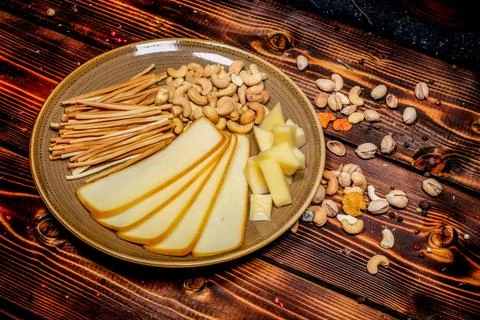 Nuts with cheese studio shot plating idea. Commercial food photography, shot  Stock Photos