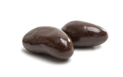 Nuts in chocolate isolated Stock Photos