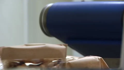Nuts Off A Conveyor Belt Stock Footage 136395178