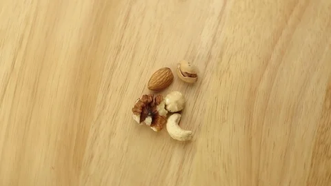 Nuts of different varieties rotate 360 degrees the view from the top Stockbeeldmateriaal 119337148