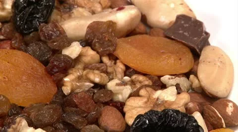Nuts, dried fruit, chocolate Video stock 10766970
